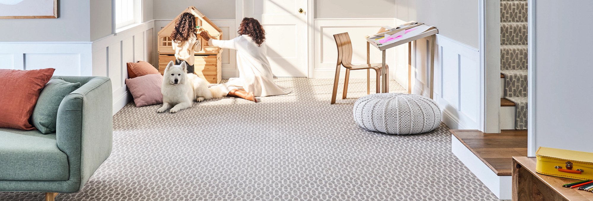 two girls and a white dog on a carpet - bdflooringinc